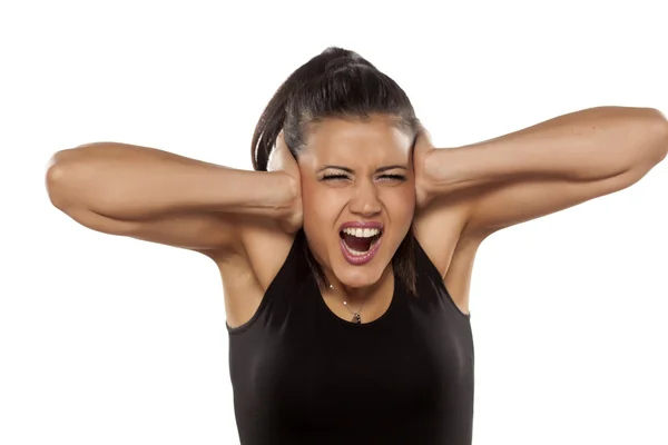 Woman can't stand the noise — Stock Photo, Image