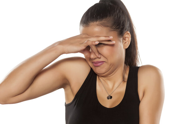 woman disgusted by the smell