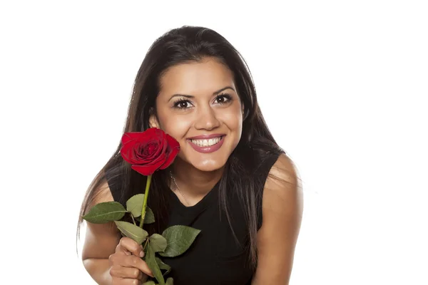 Mujer con una rosa — Foto de Stock