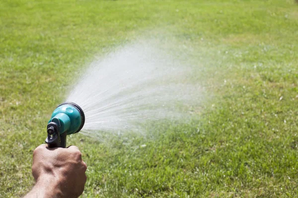 Watering the lawn — Stock Photo, Image