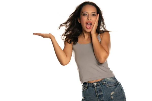 Happy Dark Skinned Woman Holding Imaginary Object White Background — Stock Photo, Image