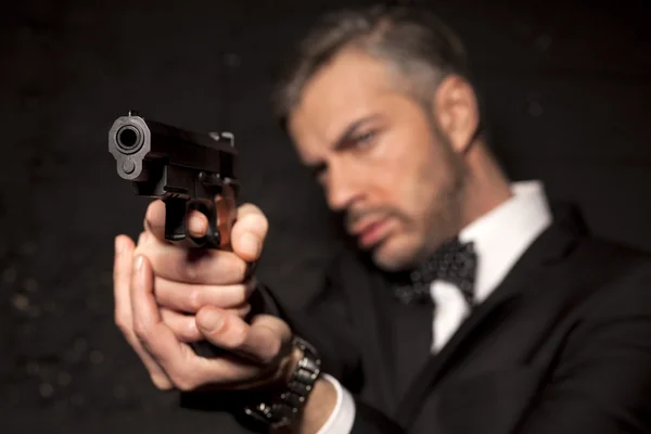 Man with a gun — Stock Photo, Image