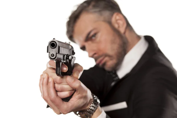 Man with a gun — Stock Photo, Image