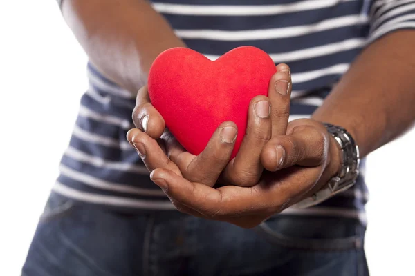 Man som håller ett hjärta — Stockfoto