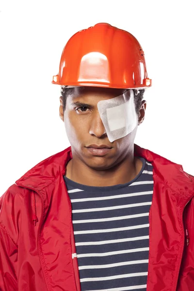 Worker with injured eye — Stock Photo, Image