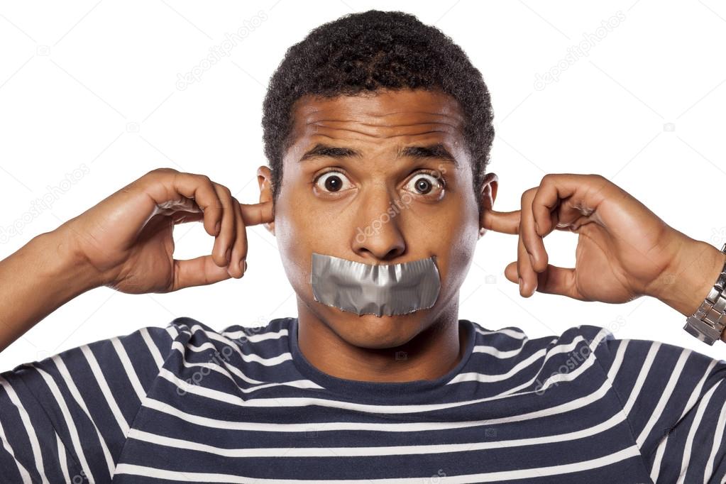 Closed ears and tape over mouth