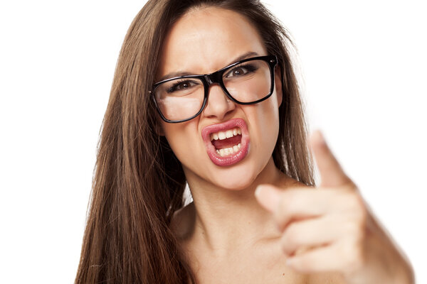 Angry woman with eyeglasses