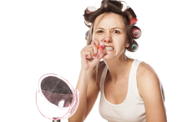 Woman with curlers — Stock Photo, Image