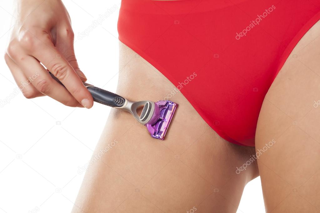 Woman shaves her crotch