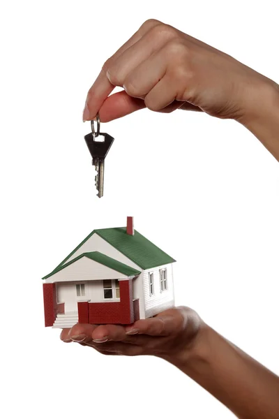 Miniature house on a hand — Stock Photo, Image