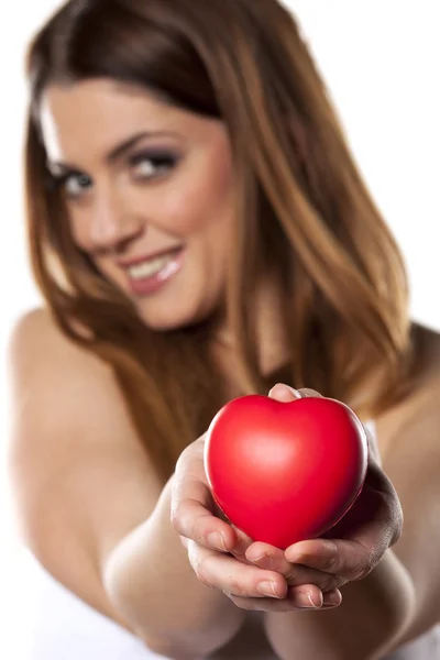 Woman offers heart — Stock Photo, Image
