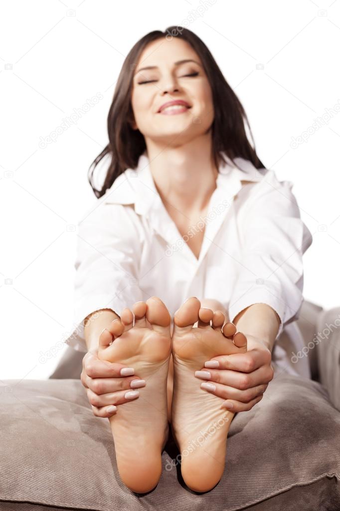 Women feet massaging