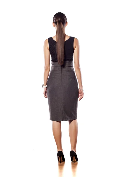 Back view of a woman in skirt — Stock Photo, Image