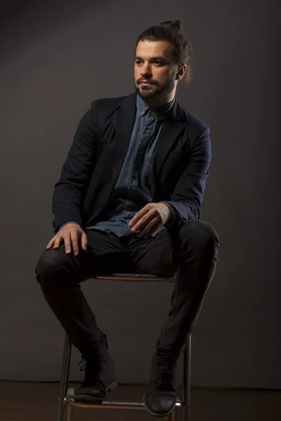 Man with beard and a bun — Stock Photo, Image