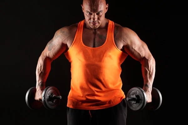 Muscular man with weights — Stock Photo, Image