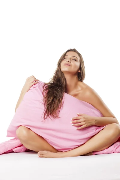 Woman hugging her pillow — Stock Photo, Image