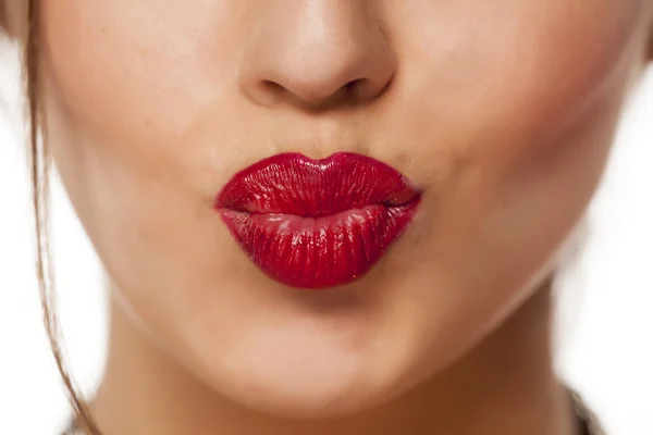 Pursed mouth with red lipstick — Stock Photo, Image