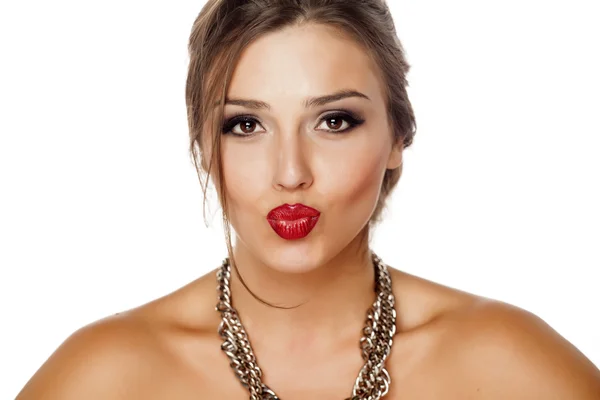 Pursed lips and a necklace — Stock Photo, Image