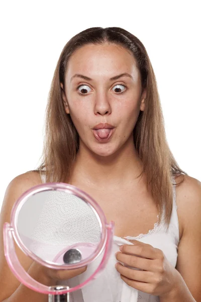 Girl sticks her tongue out — Stock Photo, Image