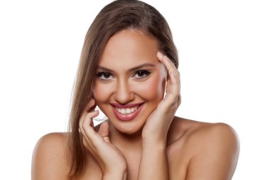 şehvetli ve gülümseyerek