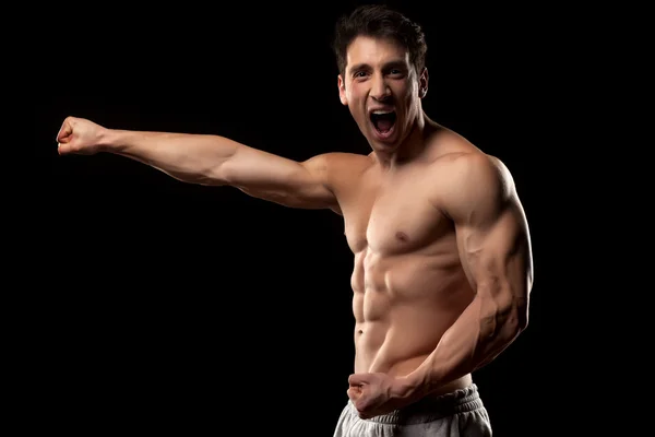 Side view of a muscular man — Stock Photo, Image