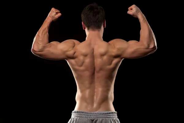 Muscular man from behind Stock Image