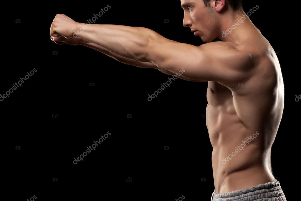 Side view of a muscular man Stock Photo by 95343284