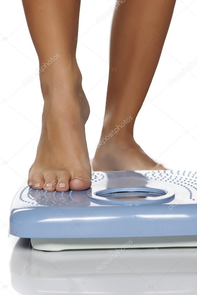 woman checking weight