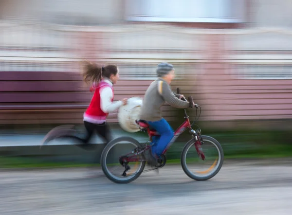 Children riding a bike — Stock Photo, Image