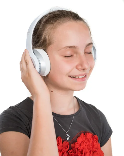 Menina sorridente em fones de ouvido — Fotografia de Stock