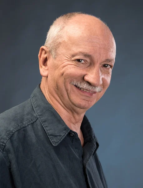 Smiling elderly man — Stock Photo, Image