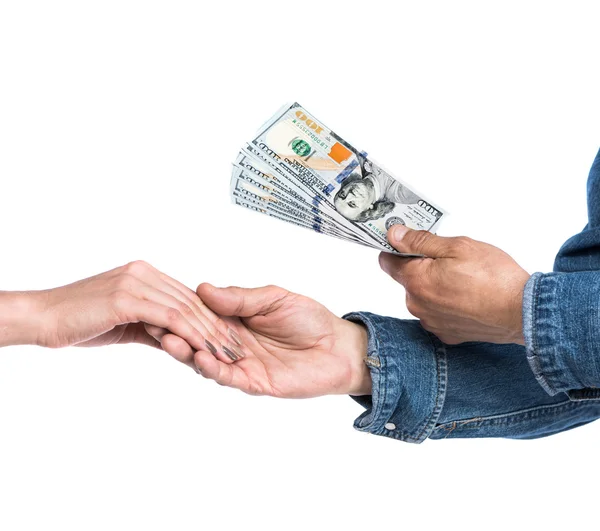 Man giving dollar bills to woman — Stock Photo, Image