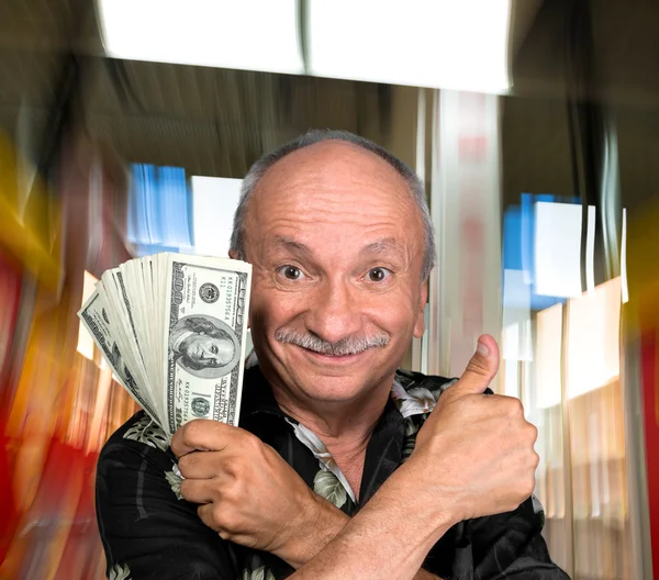 Lucky old man holding dollar bills — Stock Photo, Image