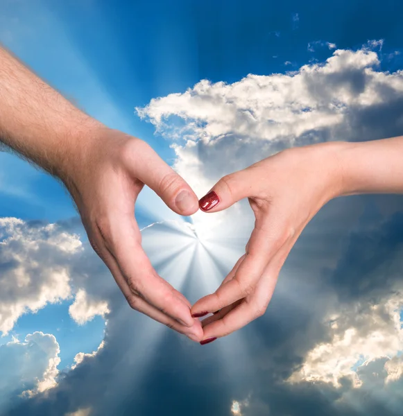 Woman and man hand showing heart shape — Stock Photo, Image