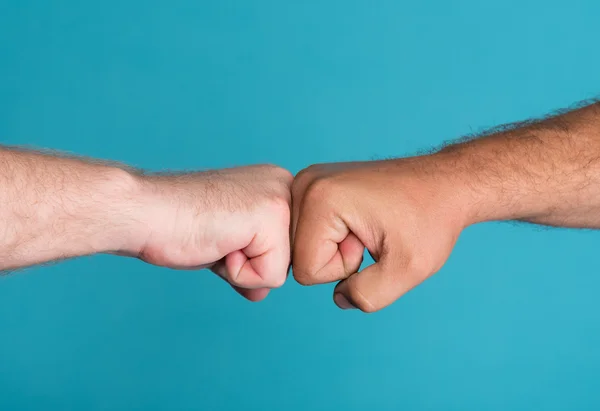 Two fists in confrontation — Stock Photo, Image