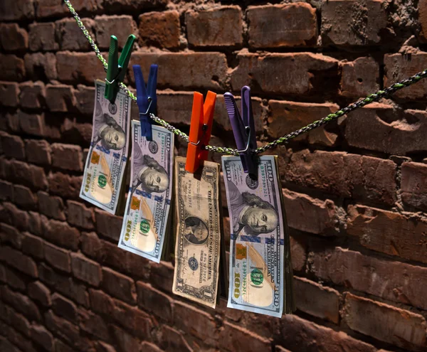 Dollar bills hanging on a rope — Stock Photo, Image