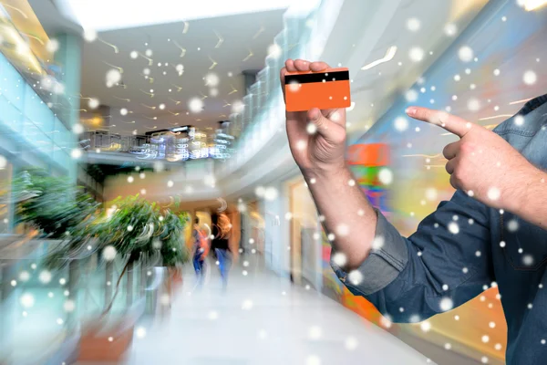 Man holding credit card in his hand — Stock Photo, Image