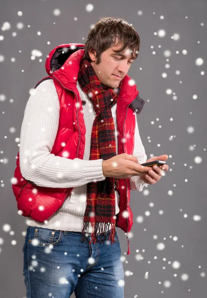 Handsome man sending a text message — Stock Photo, Image