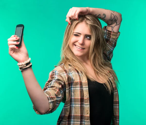 Beautiful girl taking a selfie — Stock Photo, Image
