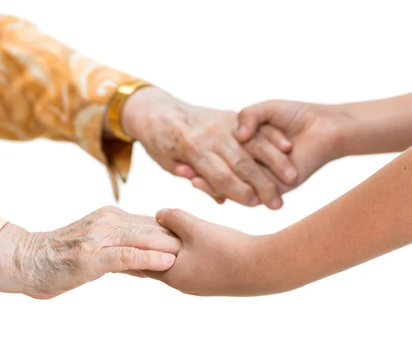 Old woman and young girl holding hands — Stock Photo, Image