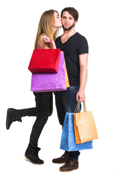 Casal feliz com sacos de compras — Fotografia de Stock