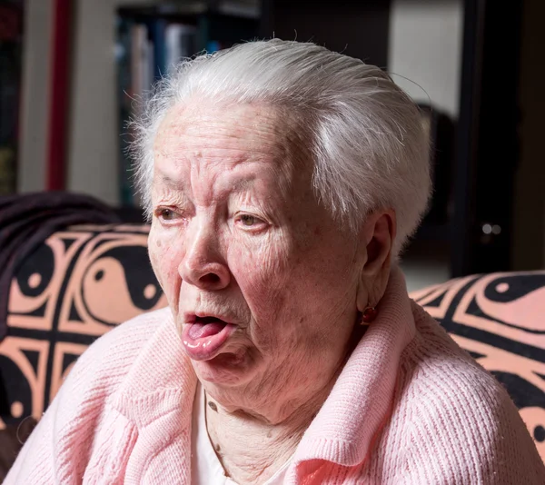 Old woman coughing — Stock Photo, Image