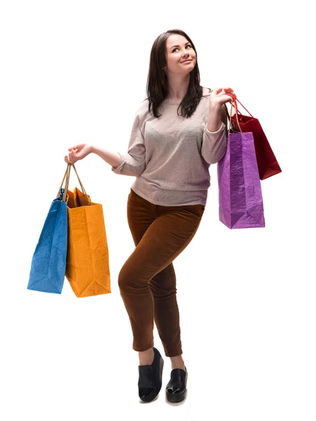 Jovem mulher feliz com sacos de compras — Fotografia de Stock