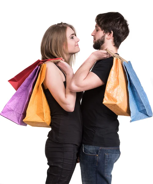 Ευτυχισμένο ζευγάρι με τσάντες για ψώνια — Φωτογραφία Αρχείου