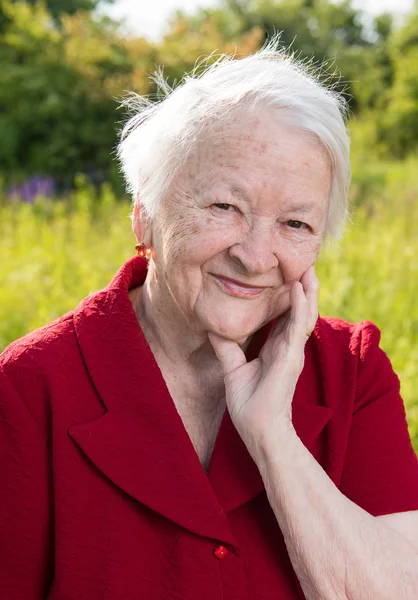 Beautiful smiling old woman — Stock Photo, Image