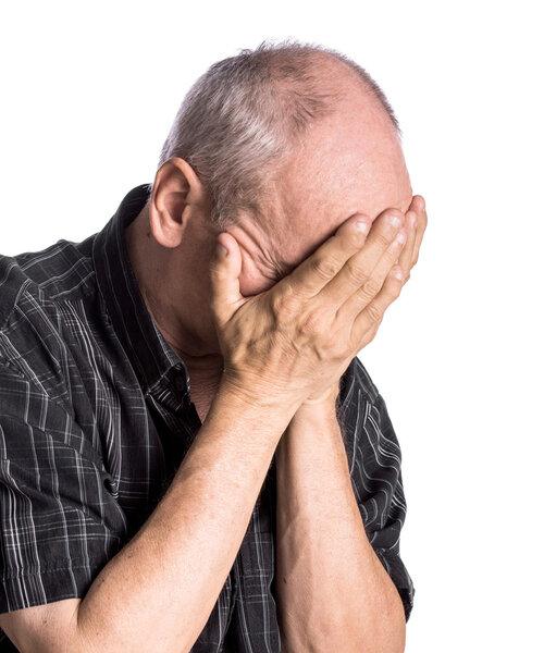 Portrait of an elderly man with face closed by hands