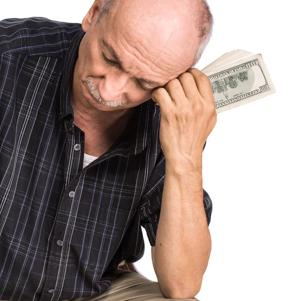 Älterer Mann mit Dollarscheinen — Stockfoto