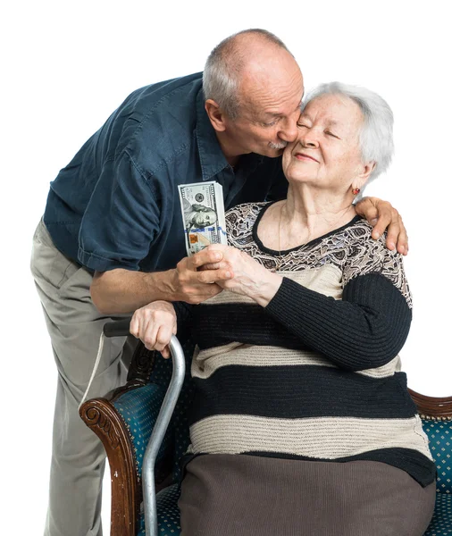 Senior man en oude vrouw met geld — Stockfoto