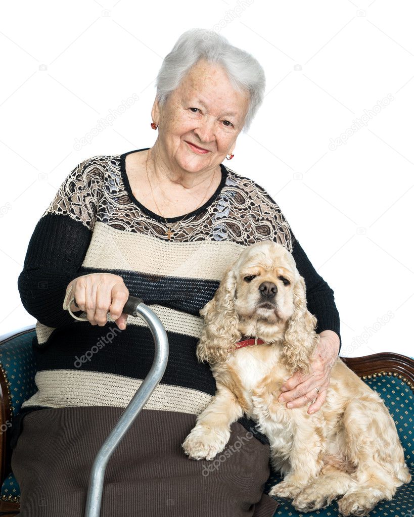 Portrait of an old woman with american spaniel