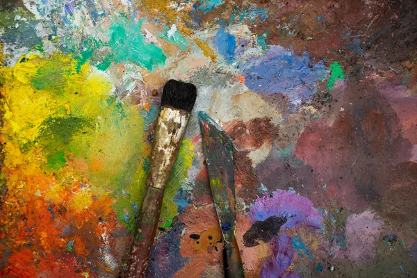 Artistic paintbrushes and palette knifes — Stock Photo, Image
